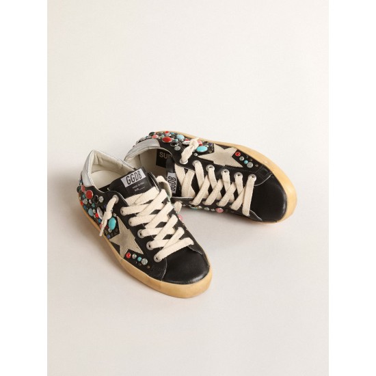 Super-Star LTD with multicolored studs and beige suede star