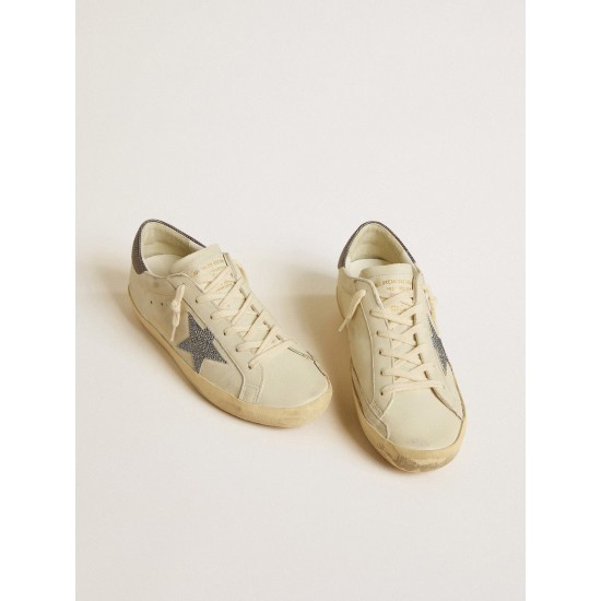 Super-Star LTD with cream-colored leather star with Swarovski crystals and blue leather heel tab with lizard print