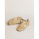 Ball Star in golden Swarovski crystals with milk-white leather star